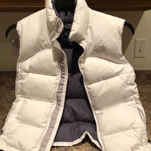 Girl’s North Face white puffer vest.